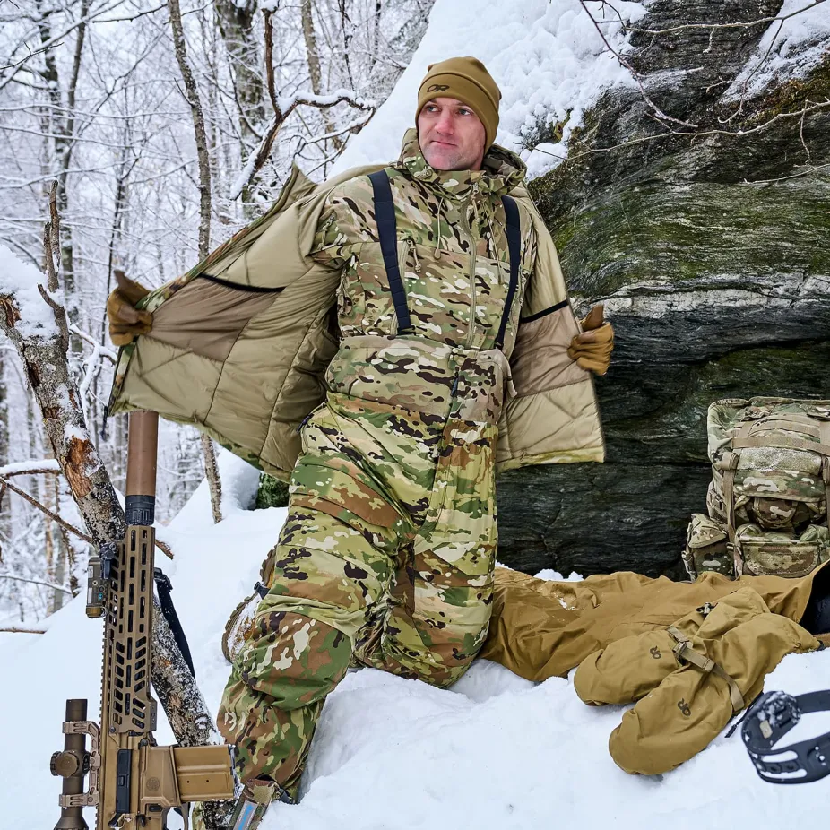 Soldier with his gear in the snow